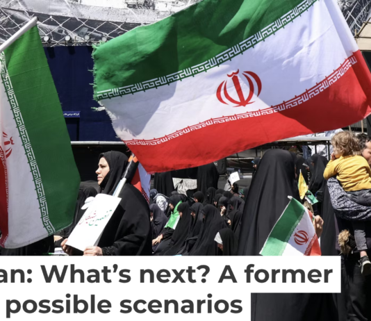 Iranians hold national flags in Tehran’s Revolution Square on April 8, 2026, after the United States and Iran agreed to a two-week ceasefire. Atta Kenare/AFP via Getty Images